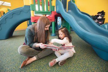 Child and Teacher Reading