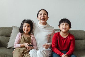 Family Enjoying Screen Time Together